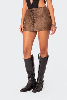 Mini skirt Front lace up detailing Zip back closure Faux Leather Model wears size S Model height is 5'7 Item care: Hand wash Leather Miniskirt, Lug Sole Boots, Faux Leather Mini Skirt, Rollerball Perfume, Leather Mini Skirt, Swimwear Dress, Mens Trends, Leather Mini Skirts, Swimwear Accessories