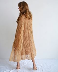 Hello, I'm the one, who won't let you down - beige alpaca cardigan. I will comfort you, keep you warm and will make you smile. I'm 100% hand made and proud of that. I consist of 35% Italian baby alpaca,35% of kid mohair and 30% nylon, which makes me incredibly natural. I'm quite unique as could be worn all year long. I'm in one size and one size fits all because my measurements are : ❤️ Width -54 cm ❤️ Lengths -100 cm If you would like me in other size, you could request a custom order with your Long Open Knit Sweater, Beige Hand Knitted Sweater Coat For Fall, Hand Knitted Beige Sweater Coat For Fall, Beige Mohair Outerwear For Fall, Hand Knitted Long Cardigan, Soft Knit Mohair Cardigan For Fall, Hand Knitted Long Sweater For Fall, Long Open Knit Sweater For Winter, Beige Long Cable Knit Sweater Coat