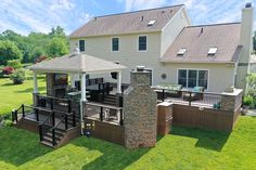 an aerial view of a house with a covered deck