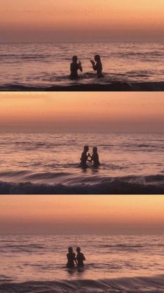 two people sitting in the water at sunset