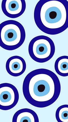 an image of blue and black circles on a light blue background that looks like eyeballs