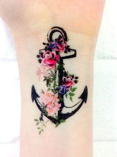 an anchor with flowers on the wrist