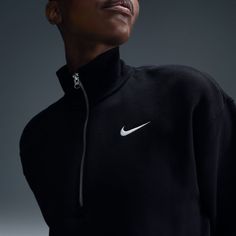 The Nike Phoenix Fleece QZ Women's Crop Top proves activewear doesn't have to be boring. It has a sophisticated style with its raised collar that gives it that extra something something. Moreover, the cropped cut makes it on point with today's fads. Cropped cut. Half-zip. Raised collar. Features embroidered Nike Swoosh on front. Elongated ribbing for added detail. Fabric: body - 80% Cotton, 20% Polyester; rib - 97% Cotton, 3% Spandex. Machine washable. Nike Sportswear Phoenix Fleece, Luxury Loungewear, Loungewear Luxury, Cropped Sweatshirt, Women Lifestyle, Crop Sweatshirt, Zip Sweatshirt, Work Casual, Nike Tops