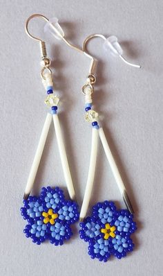 blue and yellow flower beaded earrings on white earwires with dangling hook hooks