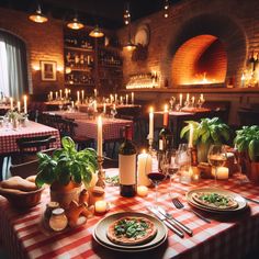 a table set with plates, glasses and candles