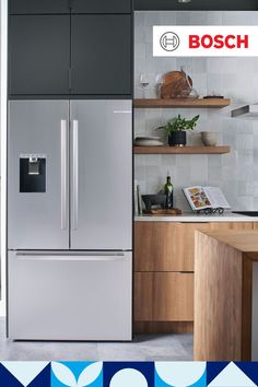 a silver refrigerator freezer sitting inside of a kitchen