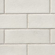 a white brick wall that is very close up