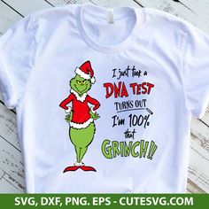 the grinch christmas t - shirt is on display