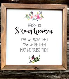 a framed sign that says, here's to strong women may we know them may we raise them