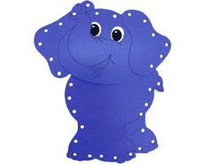 an elephant cutout with polka dots on it's ears and trunk, standing upright