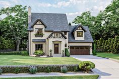 this is a computer rendering of the front of a house with landscaping and trees around it