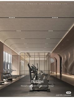 an image of a gym with treadmills and exercise machines in it's center