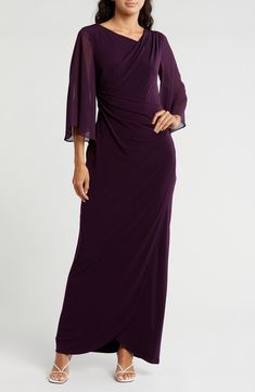 Exude classic elegance in a navy-blue gown designed with frothy sheer sleeves and shaped with delicate ruching. 58" length Slips on over head Asymmetric neck Bracelet-length sleeves Lined, except sleeves 96% polyester, 4% spandex body with 100% polyester sleeves Hand wash, dry flat Imported Navy Blue Gown, Cape Sleeves, Blue Gown, Daytime Dresses, Sweaters And Leggings, Sheer Sleeves, Comfortable Dress, Classic Elegance, Jeans Dress