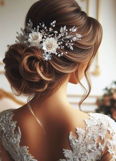 a woman wearing a bridal hair comb with flowers in it's back end