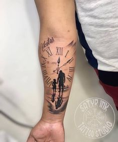 a person with a clock tattoo on their arm