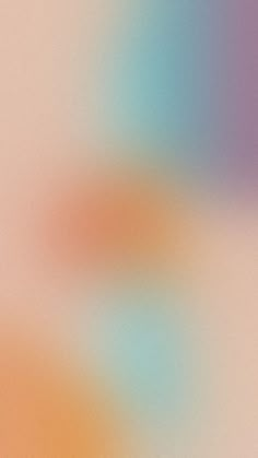 a blurry image of an orange and blue background