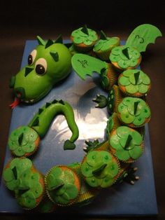 a cake made to look like a green dragon