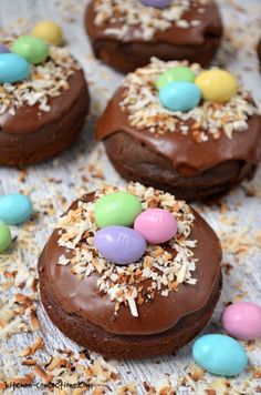 chocolate easter egg cookies with sprinkles on a table