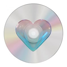 a cd with a heart shaped disc in the middle