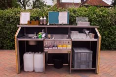 an outdoor bar with drinks and beverages on it