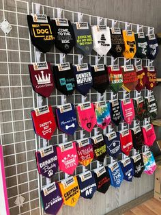 there are many socks hanging on the wall