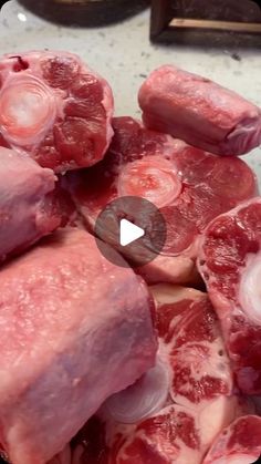 raw meat is shown in a bowl on the counter top, and then cut into smaller pieces