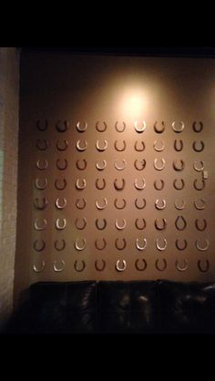 the wall is made up of circles and horseshoes