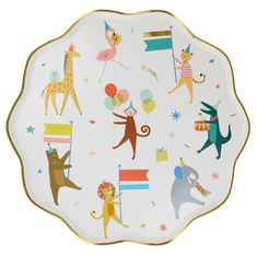 a white plate topped with animals and balloons