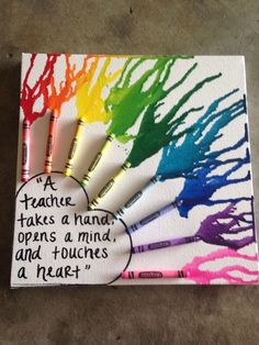 four crayons with different colors on them and the words, a teacher takes a hand, opens a mind, and touches a heart