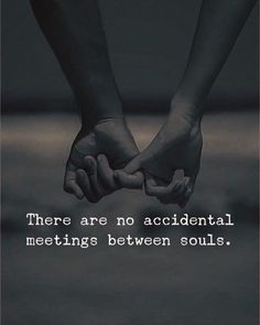 two hands holding each other with the words there are no accident meeting between souls