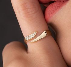 Our open cuff ring is 14k solid gold, and it has a unique and dainty style that will you love it! At the top, on one of the shank sides of the ring, it has zircon stones that look fascinating. Our gold unique ring will accompany you every day. It completes your all outfit on any occasion.  When you think of this gold dainty signet ring as a gift for your loved ones, it will be a great gift choice. It makes happy your loved ones on their birthdays, graduations, anniversaries, mother's day, valent Luxury Recycled Gold Rings With Open Band, 14k Gold Open Band Signet Ring For Gift, Luxury 14k Gold Open Ring, 14k Gold Polished Open Band Signet Ring, Luxury 14k Gold Signet Ring With Open Band, Luxury 14k Gold Open Signet Ring, Ring With Stone, Open Cuff Ring, Dainty Style