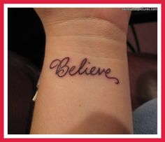 a wrist tattoo with the word believe written in cursive writing on it's side