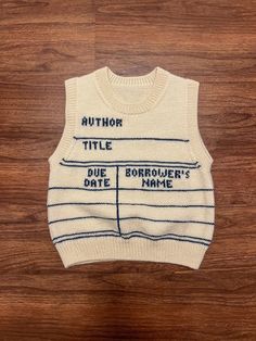 a sweater that says author title, due brother's name on the front and back