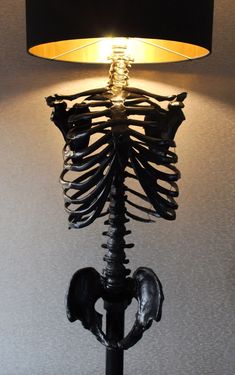 a lamp that has a skeleton on it