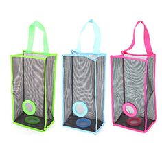 three different colored bags with handles on each side and one has a ball in it