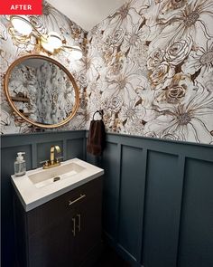 a bathroom with a sink, mirror and wallpapered walls in the background is shown