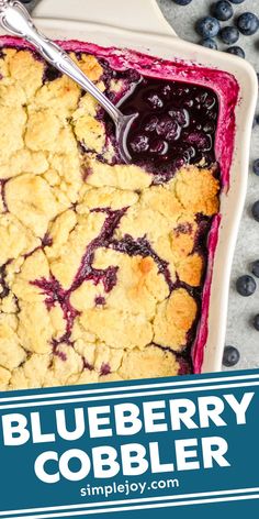 a blueberry cobbler in a white dish with a serving spoon and text overlay that reads, blueberry cobbler