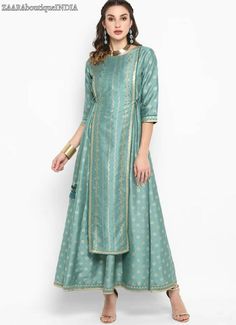 HAND WOVEN MAXI DRESS *Green and Gold-toned printed layered woven maxi dress, has a round neck, three-quarter sleeves, and flared hem *Fabric:- Material: Silk *Wash Care:- Hand Wash AVAILABLE IN 7 SIZES THEY ARE IN FOLLOWING MEASUREMENTS IN INCHES:- XS:- Bust-34/Waist-30/Shoulder-13.5/Hips-37/Length-52 S:- Bust-36/Waist-32/Shoulder-14/Hips-39/Length-52 M:- Bust-38/ Waist-34/Shoulder-14.5/Hips-41/Length-52 L:- Bust-40/Waist-36/Shoulder-15/Hips-43/Length-52 XL:- BUST-42/Waist-38/Shoulder-15.5/Hips Silk Frocks For Women, Outfit From Saree, Ethic Dress, Front Neck Design, Stylish Frocks, Frocks For Women, Golden Gown, Brocade Jacket, Silk Anarkali