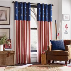 a living room with red, white and blue curtains