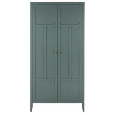 a green armoire with two doors