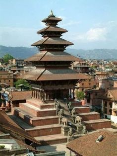 a tall tower sitting on top of a building