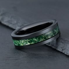 These beautiful green moss agate matching rings are the perfect way to remind yourself and your loved one of your eternal connection. Handcrafted with love, these unique rings are a timeless symbol of harmony and balance, made from natural green stone and embedded with a cluster of beautiful green moss. The two stones sparkle against each other to create a dazzling display of light that adds an unforgettable sparkle to your day. #weddingband #couplerings #matchingrings Green Wedding Rings, Wedding Ring Womens, Agate Wedding Ring, Mens Wedding Ring, Agate Wedding, Black Tungsten Rings, Green Moss Agate, Moss Agate Ring, Black Tungsten