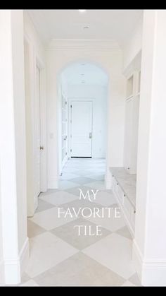 an empty hallway with the words my favorite tile in front of it and white walls