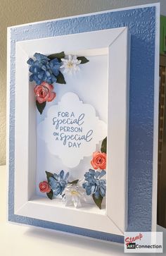 a white frame with flowers on it and a blue border around the edges that says for a special person in my life