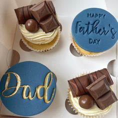 three decorated cupcakes with the words happy father's day written on them