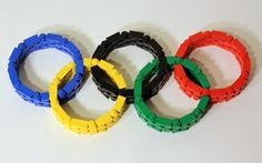 the olympic rings are made out of legos and have different colored bands on them