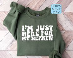 Im Just Here For My Nephew Sweatshirt, Gift For Aunt Hoodie, Cute Aunt Gift From Nephew, New Future Aunt Apparel, Funny Aunt Life Clothing ⭐ HOW TO ORDER ⭐ 1️⃣ Please check all the photos in the listing. 2️⃣ Choose your shirt size and color. (Please check listing photos for these) 3️⃣ In the personalization box, please enter your Text, Text Color, Text Style. 4️⃣ Click "Add to Cart". You can go back to the listing and follow the same steps to add more products. 5️⃣ Click "Proceed to Checkout". 6 Aunt T Shirt, Aunt Gifts From Nephew, Aunt And Uncle Shirts, Auntie Sweatshirt Ideas, Aunt Christmas Gifts Ideas, Aunt Sweater, Nephew Shirts, Aunt Sweatshirt, Aunt T Shirts