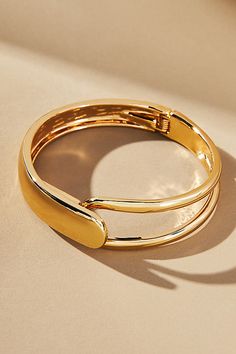 Gold: Gold-plated zinc Silver: Rhodium-plated zinc Hinge closure Imported | Half-Open Bangle Bracelet by Anthropologie in Gold, Women's, Gold/Zinc Modern Adjustable Hinged Bracelets, Modern Adjustable Hinged Bracelet, Formal Metal Bracelet With Spring Ring Clasp, Modern Metal Hinged Jewelry, Modern Metal Bracelets With Clasp, Metal Hinged Bangle Bracelets, Modern Metal Bracelet With Hinged Closure, Metal Hinged Cuff Bracelet, Hinged Metal Bracelets