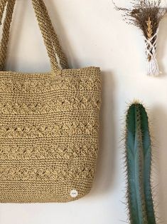 Beige Crochet Bag For Travel, Bohemian Sand Travel Bags, Everyday Crochet Jute Bag, Eco-friendly Sand Crochet Bag For Everyday Use, Everyday Jute Crochet Bags, Bohemian Sand Straw Bag For Everyday Use, Bohemian Beach Bag In Sand Color For Everyday, Bohemian Sand-colored Beach Bag For Everyday Use, Everyday Sand-colored Straw Bag