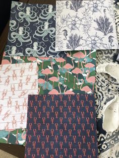 several pieces of fabric with flamingos and other designs on them, all in different colors